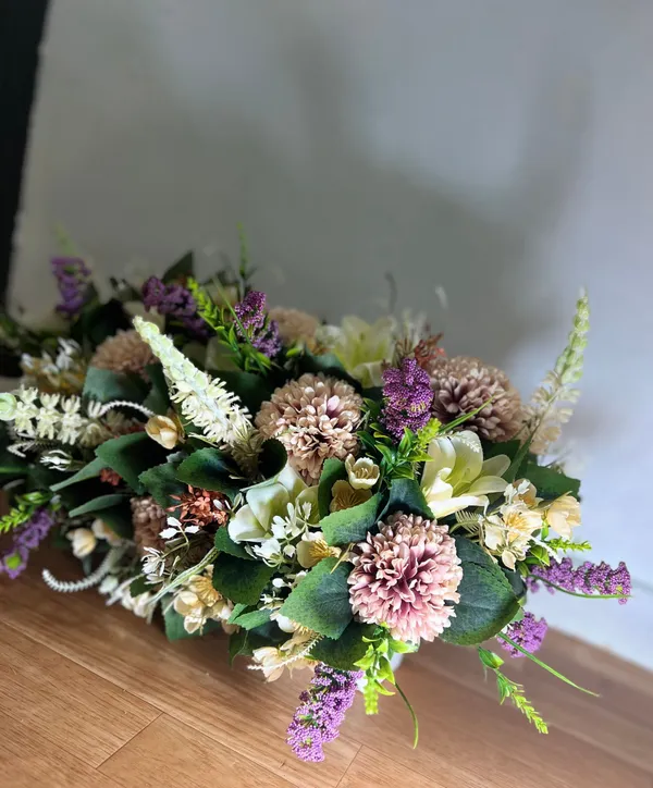 Diseño 27 - Arreglo Floral de Santos