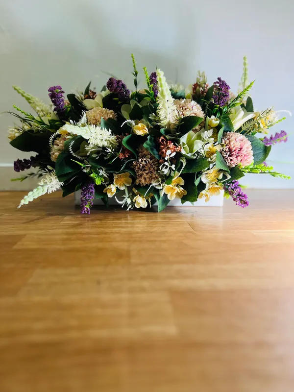 Diseño 29 - Arreglo Floral de Santos