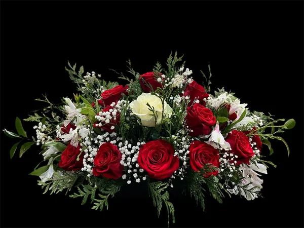 Diseño 5 - Arreglo Floral de Santos