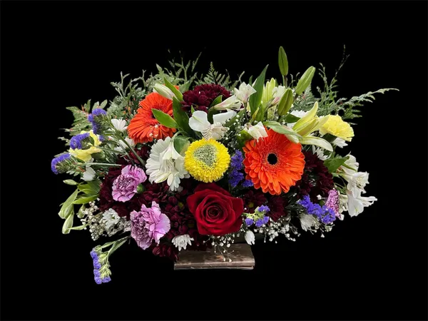 Diseño 7 - Arreglo Floral de Santos